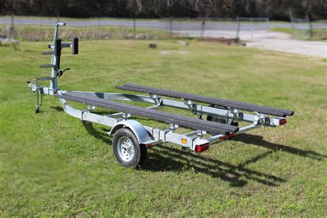 2017 Hustler Trailer 24' Pontoon Tritoon Trailer New Hustler 22' and 24' Tritoon trailers, 13" wheels with deluxe 4 step front ladder and xlarge hand rail. Comes with drive on guide rails, new winch, adjustable bunks, surge brakes on one axle, new tires and wheels. $3000. Add $200 for 26' Tritoon trailer. New spares are $130 installed. . 