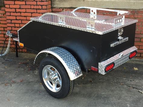 Used pull behind motorcycle trailer'' - craigslist. Mini Mate Specifications: Body Dimensions: 60"L x 40"W. Overall Dimensions: 90"L x 40"W x 37"H. Trailer Weight: 260 lbs. Tongue Weight: 25 lbs. Bed Size: 54"W x 78"L. Recommended Max Bed Weight: 500 lbs. Wheel Size: 4.80 x 8. 15 cubic ft. of storage accessible through the rear door. 