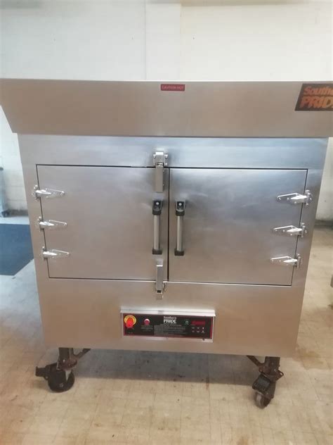 The smoker comes standard with (6), 5-tier rack hangers that hold a maximum of (30), 12" x 42" (305 x 1067mm) nickel chrome plated product racks with 3 1/2" (89mm) spacing. Manual digital control panel. The standard digital thermostat allows for cook temperature sel ection between 140° to 325°F (60° to 163°C), and will maintain consistent ...