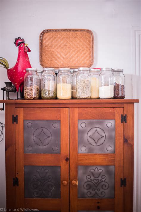 Using Mason Jars for Storage Linen and Wildflowers