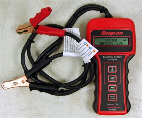 Using a snapon battery tester manual. - Onan 5500 generator operator and service manual.