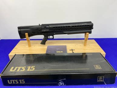 Utas firearms.  Dual 7-round magazines with automatic alternating or select...