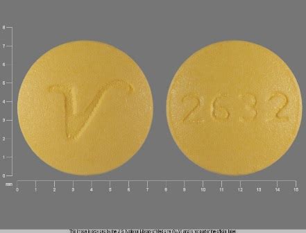 V2632 yellow pill. Serious side effects may be more likely in older adults. Common cyclobenzaprine side effects may include: drowsiness, tiredness; headache, dizziness; dry mouth; or. upset stomach, nausea, constipation. This is not a complete list of side effects and others may occur. Call your doctor for medical advice about side effects. 