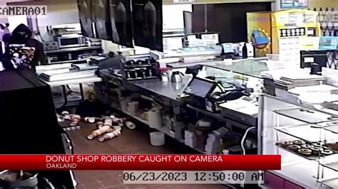 VIDEO: Employee held at gunpoint during armed robbery at Oakland donut shop