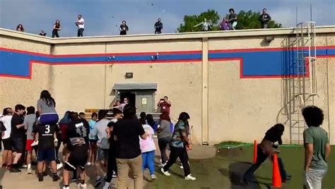 VIDEO: Teachers launch water balloons at unsuspecting Austin students on last day of school