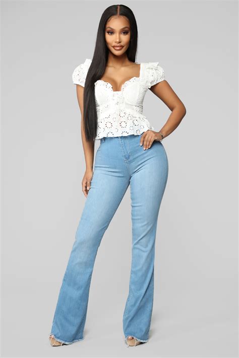 The high-waisted flare jeans are a game-changer for those seeking a flattering silhouette. Accentuating the waist and elongating the legs, these jeans effortlessly create an elegant and feminine look, ideal for both casual and more formal occasions. ... MID-RISE FLARED CROPPED TRF JEANS +3. 65.90 NZD. Z1975 HIGH-WAIST MINI FLARE JEANS +1. …. 