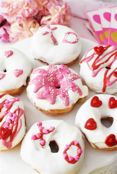 Valentine donuts. Donuts. Preheat oven to 325°. Mix the flour baking powder and salt. Set aside. Using a hand mixer - combine the sugar, egg, Greek yogurt, milk, butter and vanilla. Add the dry ingredients and mix until combined. (do not overmix) Generously spray donut pan with non stick. 