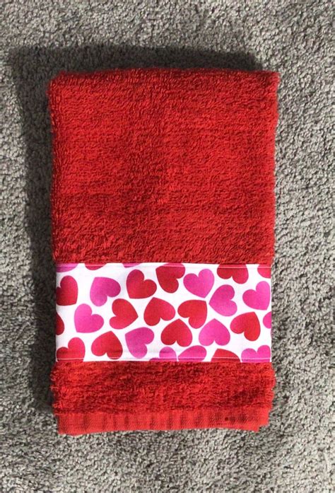 Valentine fingertip towels. Hand towels typically measure 16 inches wide by 30 inches long, whereas fingertip towels are only 11 inches wide by 18 inches long. When fingertip towels are placed in a bathroom near bath towels, they’re also frequently mistaken for a … 