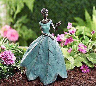 From the Valerie Parr Hill Collection. Garden maiden sculpture with three butterflies on hand Gown accented with detailed leaf design Resin construction For indoor/outdoor use Each measures 18-3/4"H x 11-1/2"L x 7-3/4"W Imported. Outdoor Garden. Indoor Outdoor. Valerie Parr Hill. Sneak Preview. Upcoming Events. Bronze Sculpture..