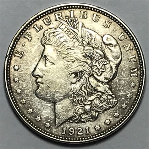 Oct 9, 2023 · The 1921-S Morgan Silver Dollar’s value varies