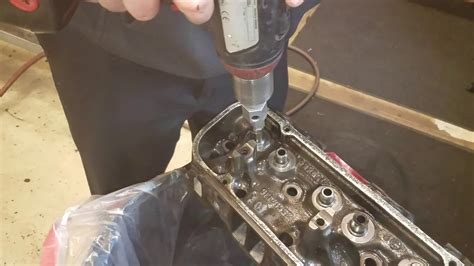 Valve guide tool.  Tools for trimming length and forming for Positive Valve Stem Seals.  The ...