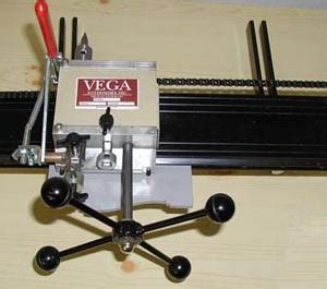 Cuz Vega makes probably THE best duplicator for a lathe of any I've ever seen on the market. Show me something better and cheaper to maintain. I've used Vega duplicators to turn out more lures than you've probably seen in your life..