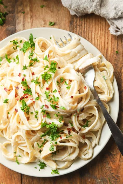 Vegan alfredo. While the pasta is cooking, mix the cornstarch and 2 tablespoons of water in a small bowl until the cornstarch dissolves. Two minutes before the pasta is done, add the cornstarch and water mixture, … 