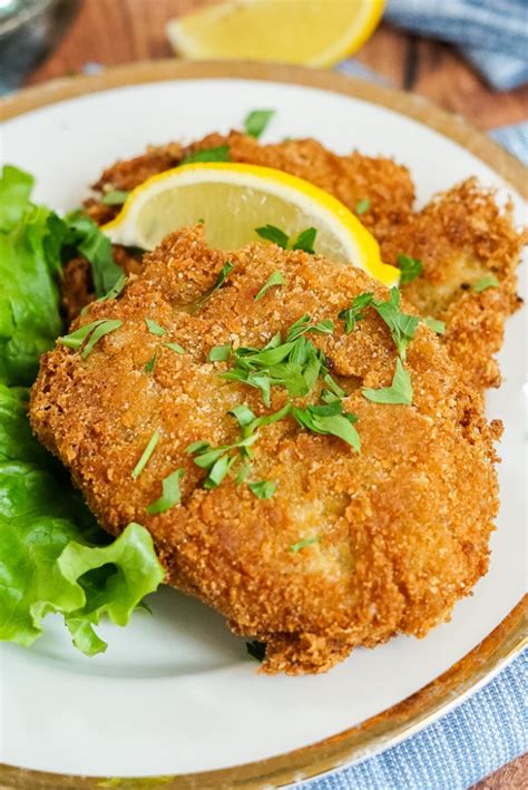 Vegan schnitzel. Peel garlic and squeeze through a garlic press. Beat the butter in a warm bowl until fluffy and stir in the garlic, herbs, lemon juice and salt. Cover the butter and refrigerate. 2. Cut the eggplant into 1 cm (approximately 1/2-inch) thick slices, sprinkle with salt, place in a colander and let stand 20 minutes for some of the water to drain ... 