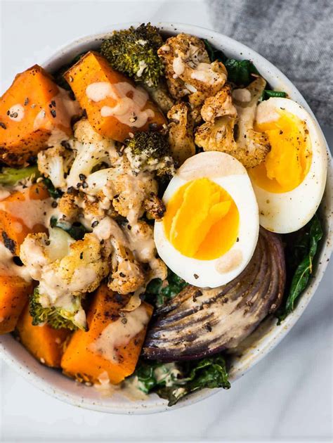 Vegetarian bowl recipes. Place the now-cooked noodles and bok choy into a large soup bowl. Ladle a few cups of the simmering vegetarian ramen broth over it. Slice eggs in half lengthwise and place in the bowl. Top it off with reserved shiitake mushrooms, scallions, and sesame seeds (if preferred). Serve. 