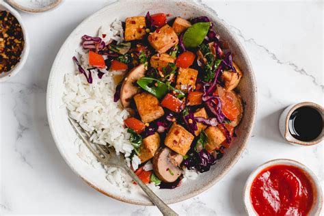 Vegetarian chinese. Sticky Tofu is a quick and easy vegan recipe ideal for weeknight dinners. It involves stir-frying tofu cubes until golden and crispy, then coating them with a sticky sauce made from hoisin sauce ... 