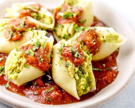Vegetarian stuffed shells. Drain and rinse with cold water. Arrange in 1 layer on a clean, lint-free kitchen towel; set aside until ready to use. While pasta cooks, heat oil in a 12-inch high-sided broiler-safe skillet over medium-high. Add sausage; cook, stirring often, until sausage crumbles and begins to brown, 6 minutes. 