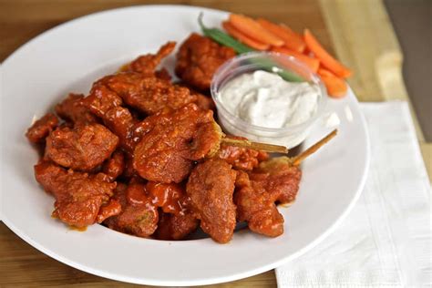 Vegetarian wings. 1 tsp onion salt. 1 tsp pepper. peanut or vegetable oil for frying. Buffalo Sauce. Maple Garlic Sauce (recipe below) Instructions. Heat oven to 425F and roast cauliflower in oven for 40 minutes, turning after 20 mins. Remove cauliflower from heat and set aside. Whisk together egg replacer and set aside. 
