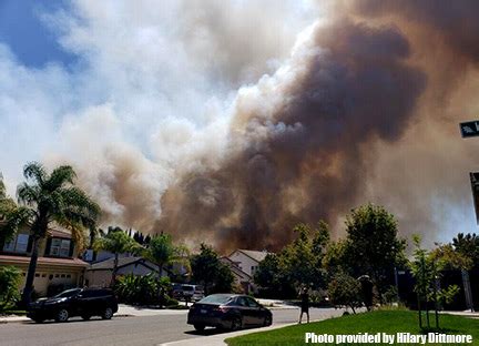 Vegetation fire threatens homes in East Oakland