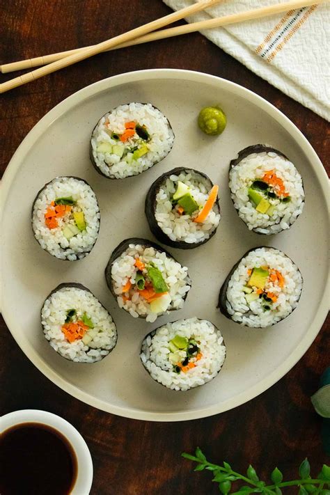 Veggie sushi. Vegan sushi is made from rice that has been coated in a seasoning sauce and then stuffed with an assortment of sliced vegetables before rolling. … 