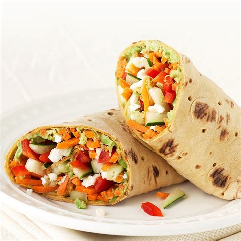 Veggie wrap recipe. Top with 2 tablespoon of red pesto. Add a small handful of arugula. Place two slices of halloumi cheese on top of the arugula. Add ¼ of an avocado in slices and top with 2 tablespoon roughly … 