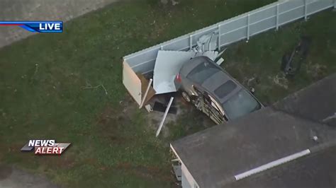 Vehicle crashes into home near Hollywood Hills Elementary School