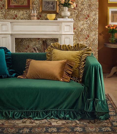 Nov 8, 2022 · It almost seems like Mitchell took notes from Lopez for this space. But while J.Lo’s green couch room goes in a more subdued direction with its color scheme, Mitchell’s embraces high drama completely. The actor and entrepreneur opted for a jewel-toned velvet sofa, pairing it with dark walls and other furniture of equally rich hues and ... . Velvet green sofa