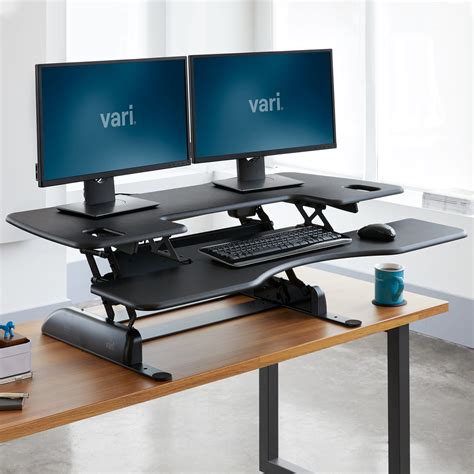 Veridesk. A standing desk is a great way to alleviate some of these problems and keep your body active during a long day in the office. And with the Varidesk Pro Plus 48, you can turn almost any standard ... 