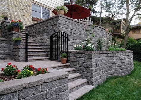 Versa lok retaining wall. VERSA-LOK segmental retaining walls are made from high-strength concrete units, dry-stacked, interlocked with pins, and set on granular leveling pads. These mortarless walls do not need frost ... 