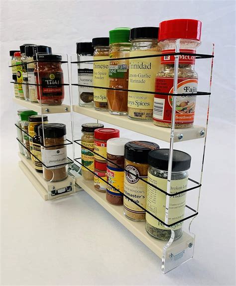 Vertical spice. Nov 11, 2023 · Vertical Pull-out Spice Rack. This novel design brings convenience and organization to a whole new level. Sliding out to reveal your neatly arranged spices, it makes kitchen operations significantly smoother. Space-saving and user-friendly, it’s a smart solution if your kitchen is lacking in storage or counter space. 1. 