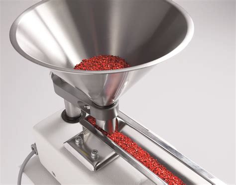 The E/Series of vibratory feeder is the logical solution in taking scoop and scale companies to the next level. Our economical linear net-weigher machine provides precise feeding and weighing of free-flowing and occasionally non free-flowing products such as coffee, beans, granola, and others can be filled at rates of 12-15 containers per minute, depending on model and application. .