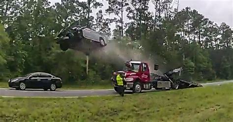 Video: Car launches over tow truck in Georgia
