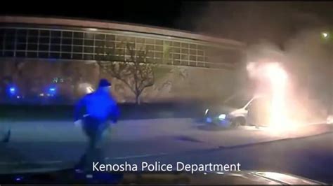 Video: Wisconsin officers pull 84-year-old to safety as van erupts in flames