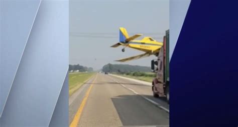 Video shows crop dusting plane nearly clipping semi-truck in Northwest Indiana