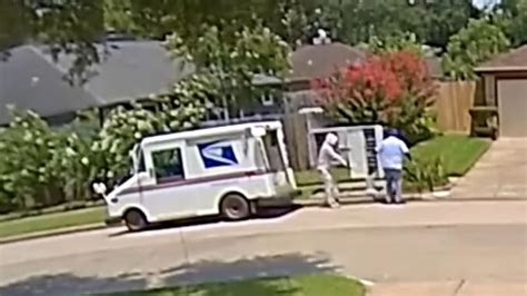 Video shows postal carrier robbed at gunpoint on West Side