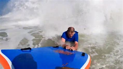 Video shows swimmer rescued from potentially deadly rip current