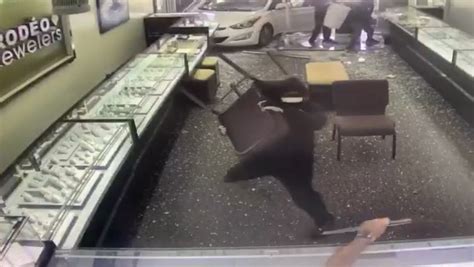 Video shows thieves crash through jewelry store, assault clerk in La Verne