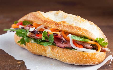 Viet sandwich. Add the pork, seasoning, garlic, and pepper and cook, stirring, until just cooked through, about 2 to 3 minutes. Remove the heat and set aside covered with foil to keep warm. Make the sandwiches: Preheat oven to 400 degrees F. Slice the baguettes open lengthwise, and slather the insides with mayonnaise. Arrange the baguettes on a baking sheet ... 
