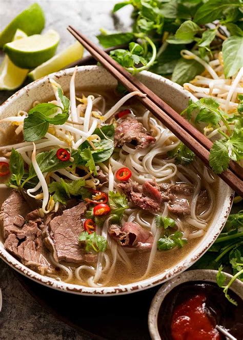Vietnamese pho. Apr 5, 2023 · For each serving, place about 4 ounces (115g) noodles in each bowl. Top with a few pieces of sliced shank, tendon, tripe, meatballs, and raw beef round. Garnish with sliced onion, scallion, and cilantro. Ladle about 1 1/2 cups hot broth into bowls and sprinkle with freshly ground pepper. 