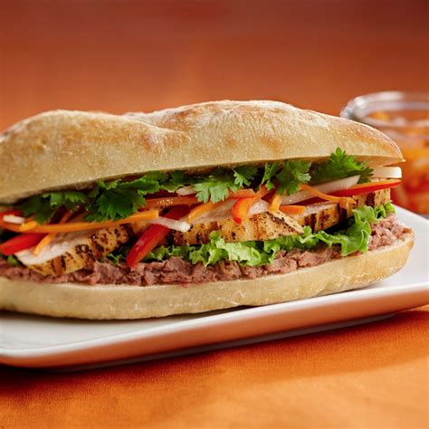 Vietnamese sandwhich. Dec 4, 2020 · Slice the baguettes in half. Slather the bottom half with mayonnaise or butter. Next, spread on the liver pate. Layer on the cold cut meats (cha lua / pork sausage, headcheese, pork slices). Add the pickled daikon and carrot (do chua). Next, add cucumbers, cilantro, and chilies (if you like it hot, or omit). 