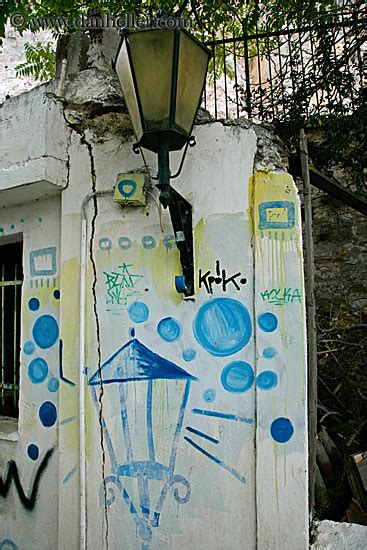 View from SE of graffiti on a lamp-post on the north side of graving ...