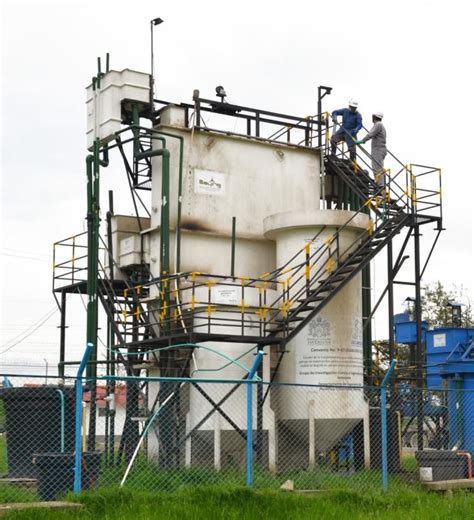 View of the Activated Sludge Pilot Plant. Primary Settler (left ...