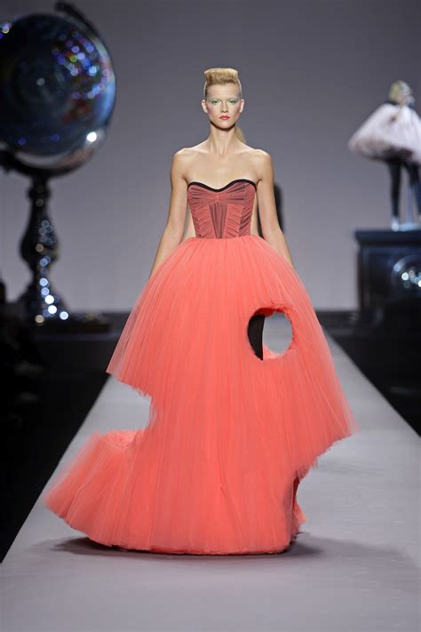 Viktor rolf. An exhibition of work by fashion designers Viktor & Rolf is on show at the Barbican Art Gallery in London. The show includes a six-metre high dolls' house designed by Siebe Tettero, filled with 54 ... 