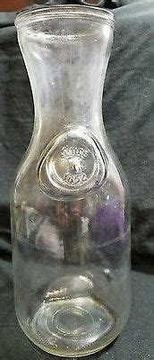 Vintage Dairy Clear Glass Dent Milk Bottle. Marked since 1852