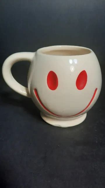 Vintage McCoy Pottery White Smiley Face Coffee Mug Red Eyes