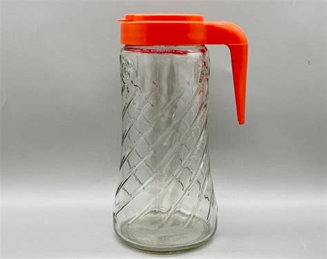 Vintage Tang Glass Pitcher with Orange Lid - Poshmark