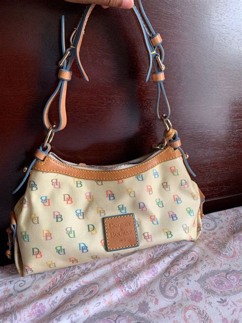 Here you'll find beautiful vintage dooney collections of Purses listed by material: Leather Fabric Coated Fabric ... Vintage Dooney Bourke Repairs & Restoration Dept. Free Priority Shipping on Orders $119+ Our Policies; ... #DB-H 110 Dooney Medallion Tiney East/West Bag New w/Tags. $200.00 $168.00. #DB2249 Breezy New Dooney & Bourke Blue Flap ...
