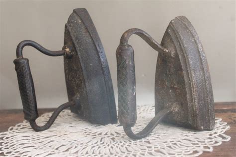 Vintage iron. Sad Flat Iron Antique Heavy Paper Weight Door Stop Wrought Cast Iron Bookend 6" Tall 3 3/4" Wide 4 1/2" Deep Including Handle. (1.2k) $35.00. RARE Find! Antique Cast Iron Sad Iron with Wood Handle by Ensible No#2... Please Read Description Carefully. (1.5k) 