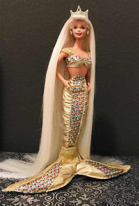 Set/16 Mermaid Tail Fin in glitter dusted with Pink Gold, Cake or Cupcake toppers candy, Birthday Party, Baby Shower party favor. (459) $28.00. SALE! Jewel Hair Mermaid "BARBIE"/Vintage 1995/Beautiful Mermaid With Longest Hair Ever Made! Colorful Shooting Stars To Place In Her Hair! . 
