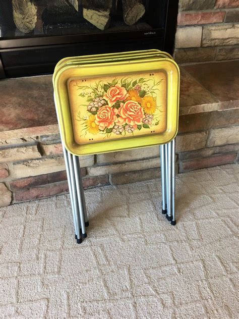 Set of 4 Vintage Mid Century 1970s TV Folding Tray Tables Collapsible Asian Floral Chinoiserie Butterfly MCM Gold Decorative Side Table. (180) $375.00. FREE shipping. Set of 12 groovy midcentury snack trays. These vintage green leaf metal trays are perfect for your snazzy midcentury entertaining. (1.5k) $48.00.. 